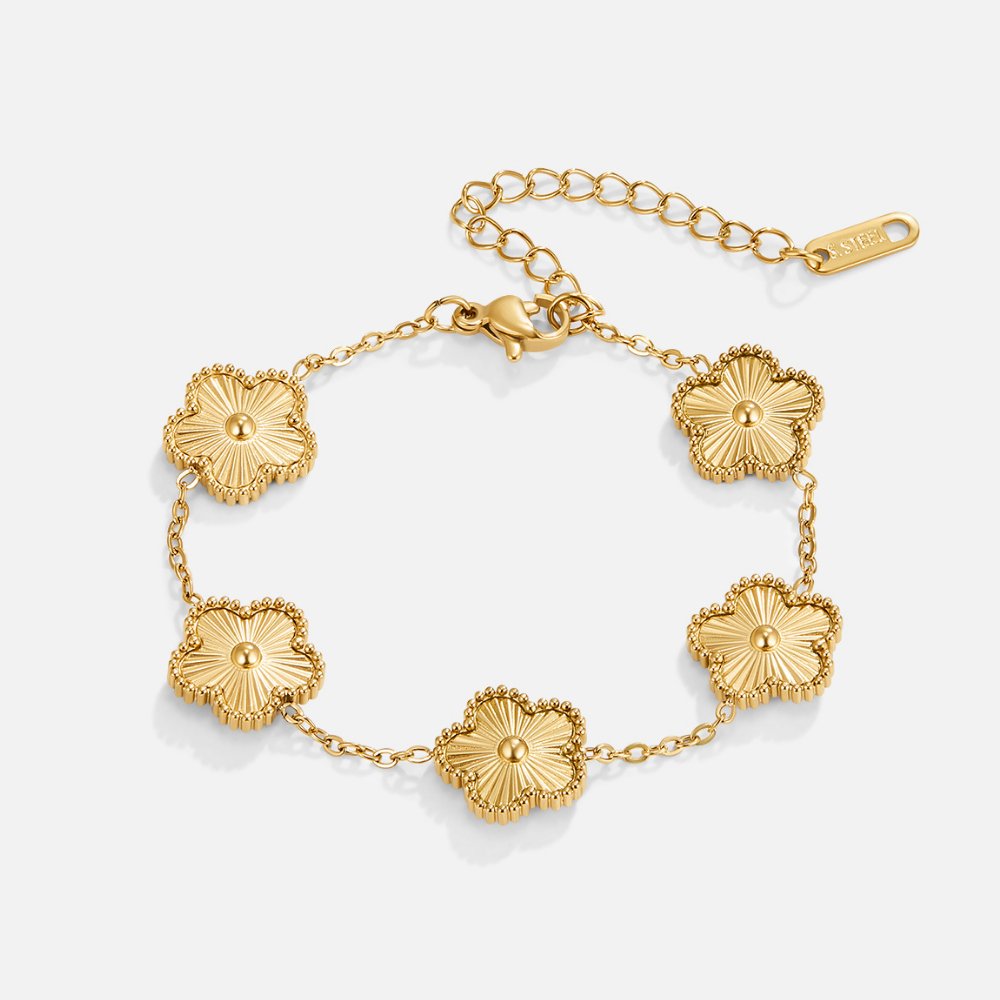 Guldfärgat fyrklöverarmband