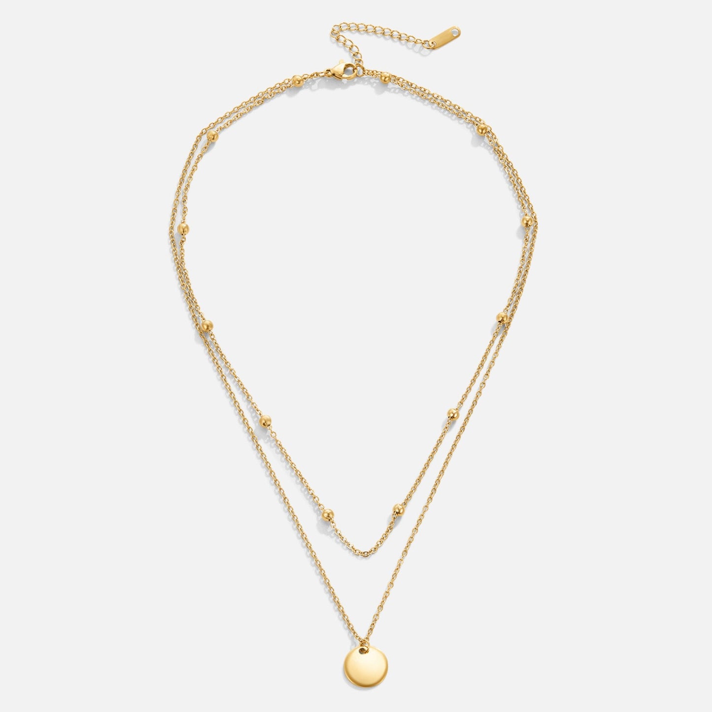 Lager-på-lager halsband med berlocker